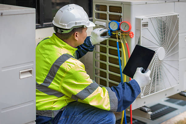 Professional Hvac technician working in Newport, DE